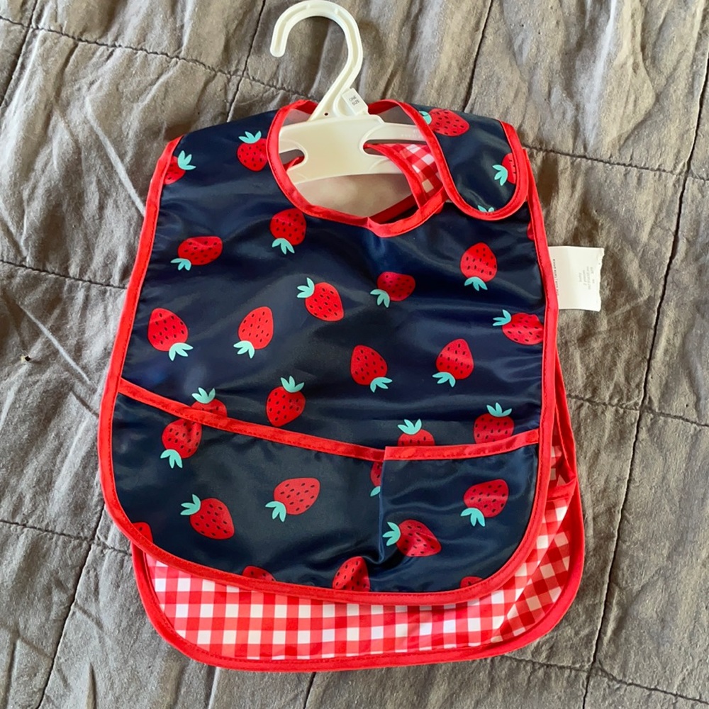 Carter’s wipeable bibs.  NWT